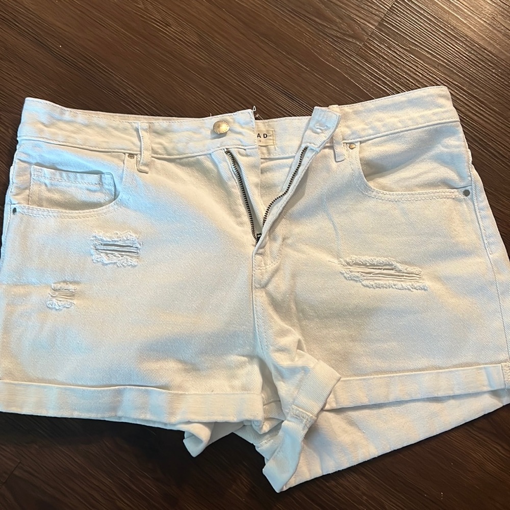 White shorts- high rise short style